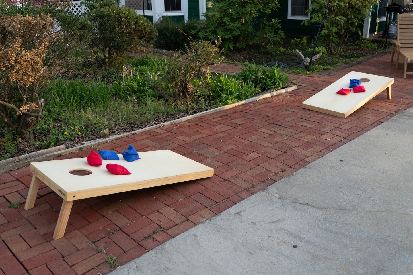 Cornhole boards set up on the patio