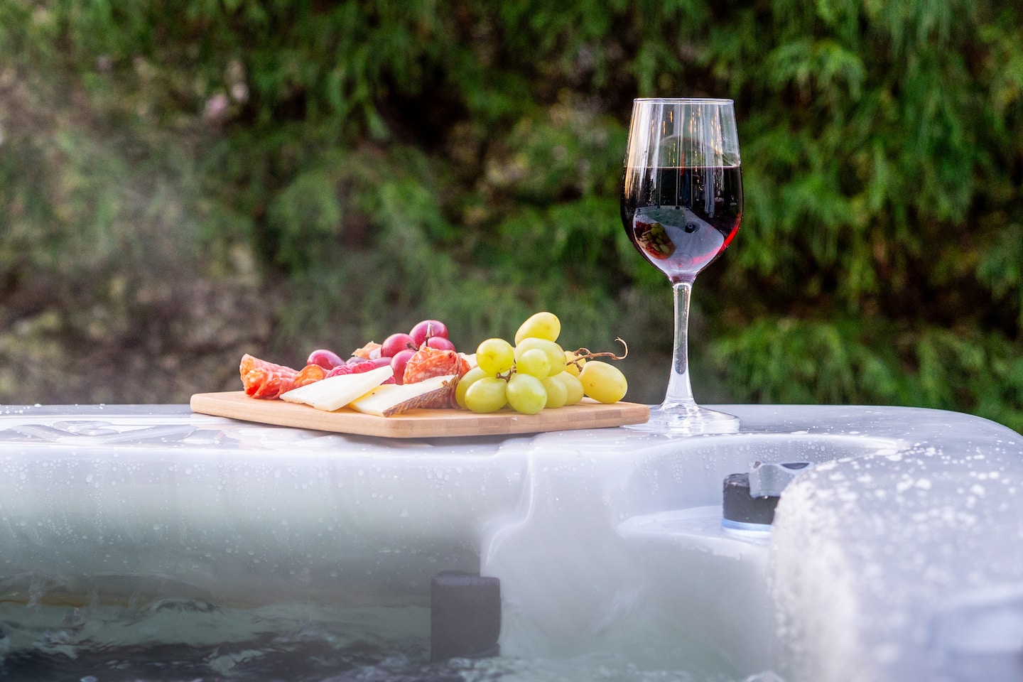 Hot tub tray with wine and charcuterie