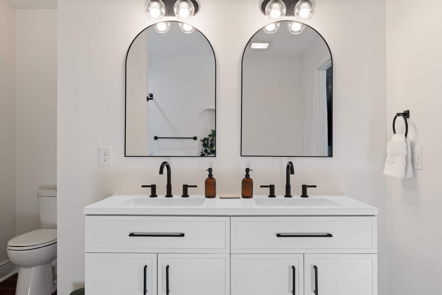 Bathroom with double vanity and mirrors