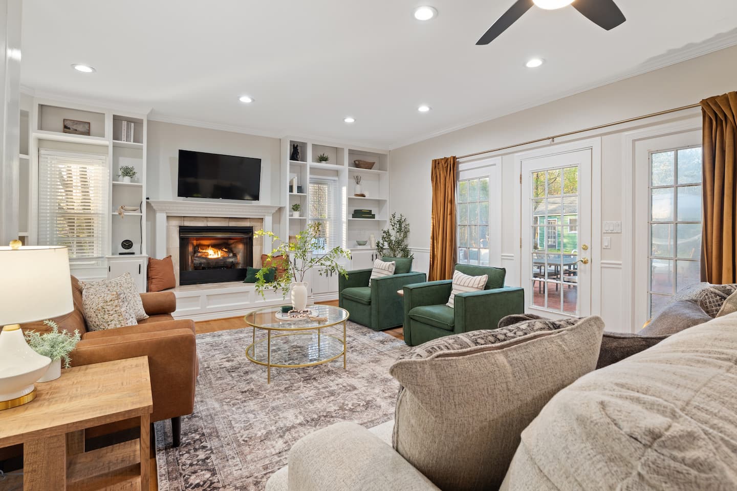 Living room seating with fireplace and TV