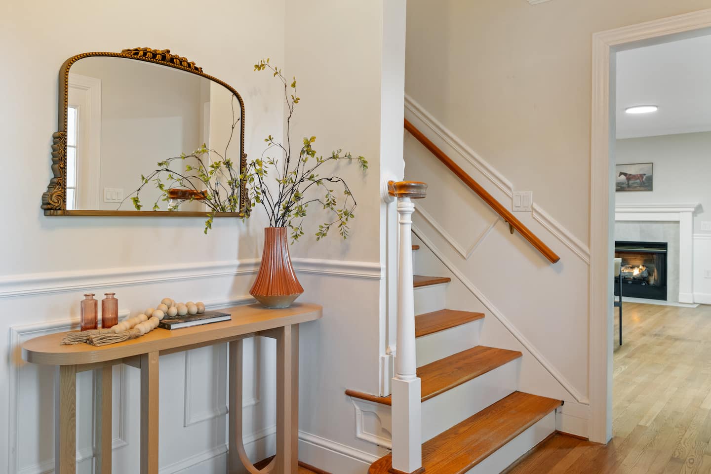 Photo 9 — Entry hall and staircase