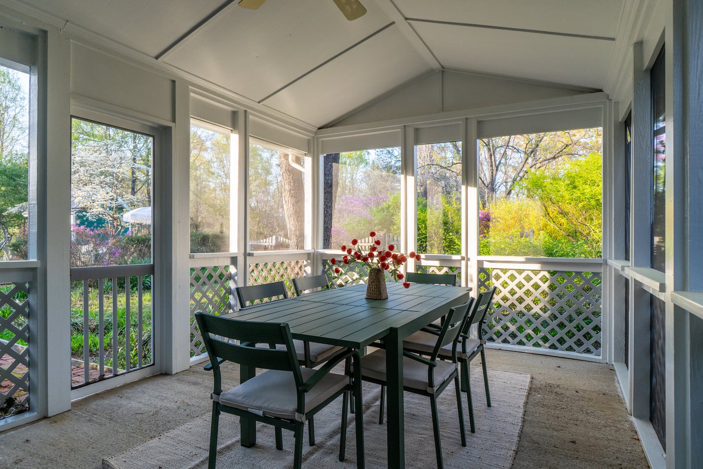 Screened porch with dining table