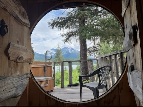 Spectacular treehouse claw foot tub w/ lake view.