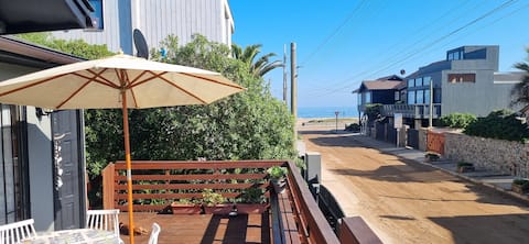 Bright house steps from the sea