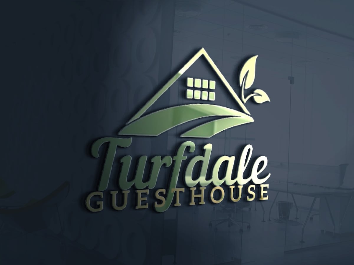 The image displays the logo of Turf Dale Guesthouse, featuring a stylized house with a sloped roof and a window, accompanied by a leaf design. The name 'Turf Dale Guesthouse' is elegantly presented in a modern font below the logo.