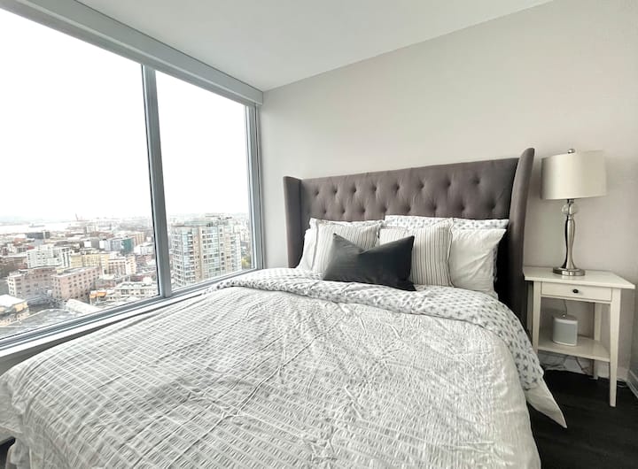 Primary bedroom with a luxurious queen bed