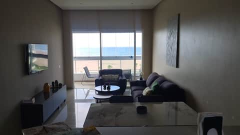 Successful Airbnb property: Front ocean view & private beach access in Lamharza Essahel