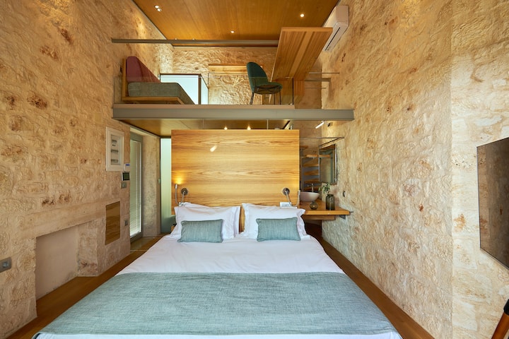 Vilë fshati me një dhomë gjumi dhe hapësirë ndenjjeje/pune