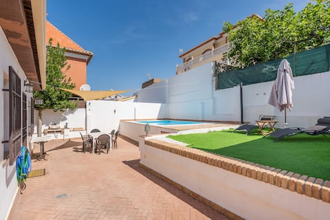 A detached house with pool.