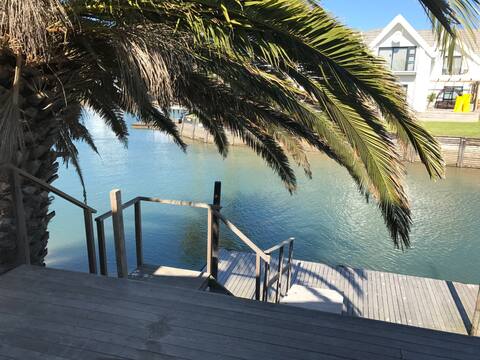 Canal-Side Thatched Paradise