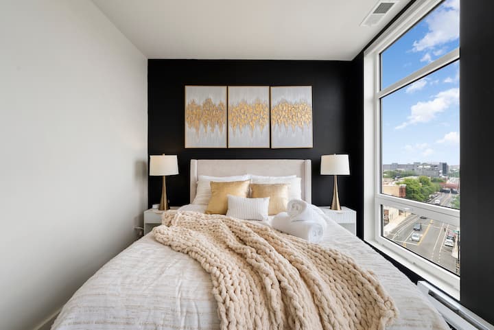 Bedroom Retreat: Enjoy stunning views and elegant decor in this stylish urban escape!