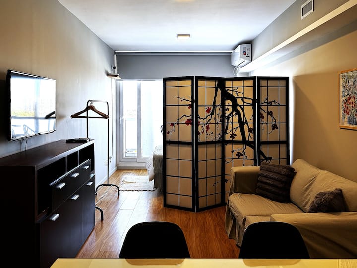 Modern studio apartment with balcony view in San Telmo