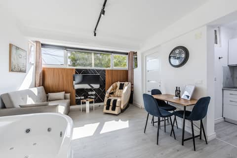 Popular Airbnb listing: Green Luxe Suite 2 | Private Hot Tub in Lagjja 5