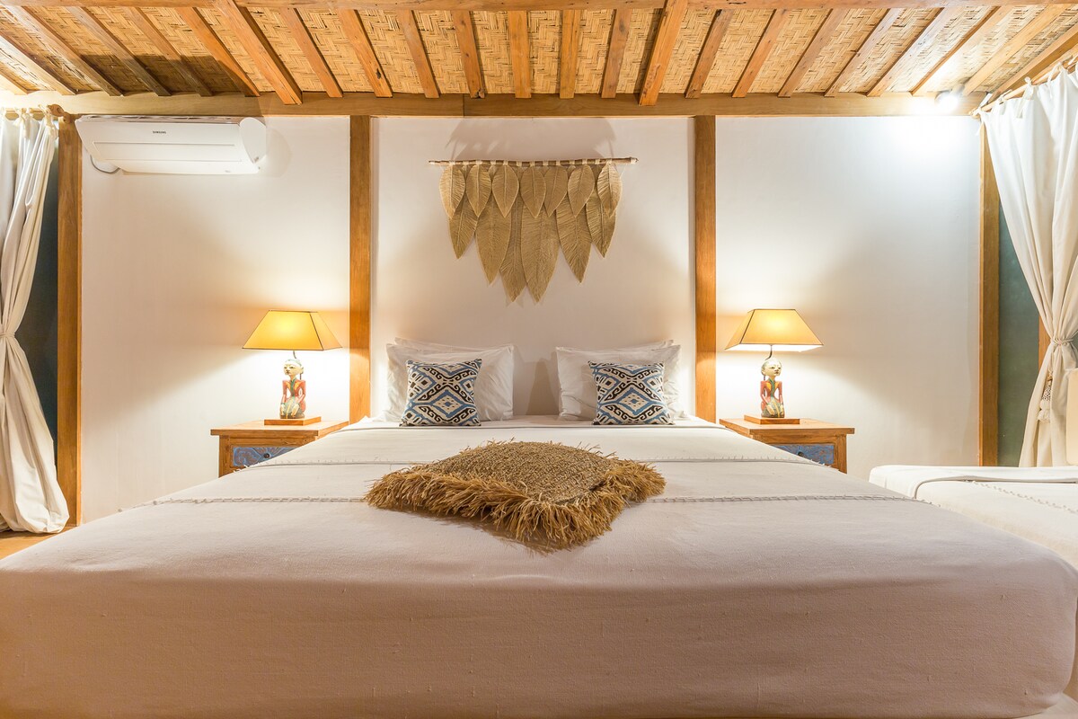 Dormitorio 5: 1 cama tamaño king (180 x 200 cm) + 1 cama individual (90 x 200 cm)