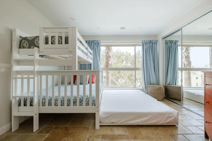 The bunk room has a twin over queen bunk bed with a queen trundle.