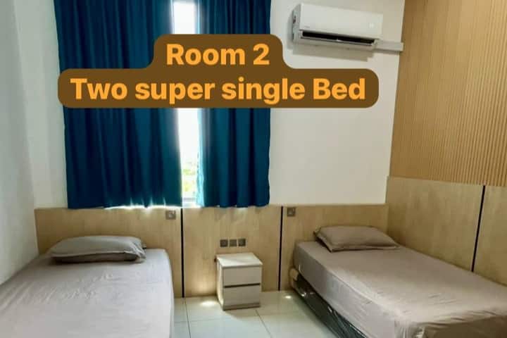 Kamer 2
• 2 Super eenpersoonsbedden
