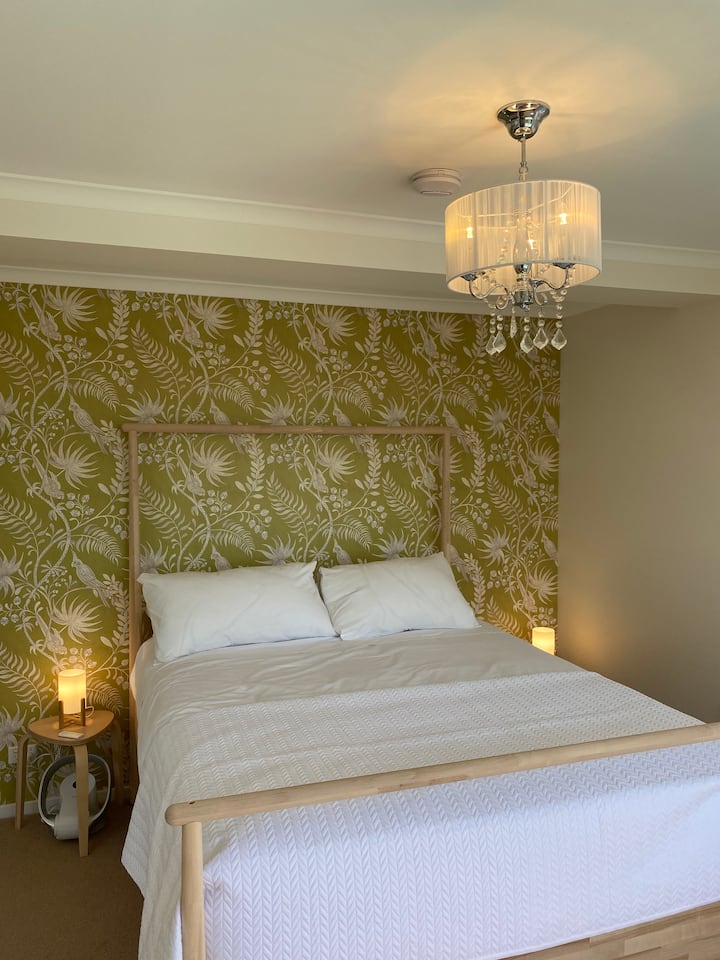 Cockatiel Room with Queen Sized bed and views to the pool deck