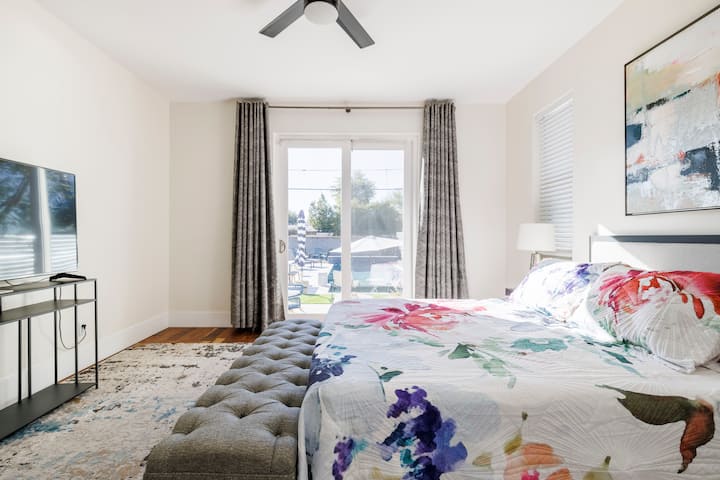 Master bedroom that walks off to the large backyard patio