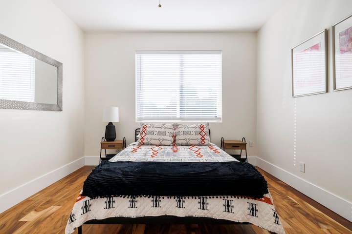 Second guest bedroom overlooking the backyard and pool