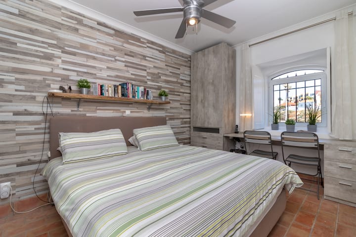 The master bedroom features a comfortable king-sized bed that is 2.0 m wide.

Enjoy ample storage space and a dedicated working area.