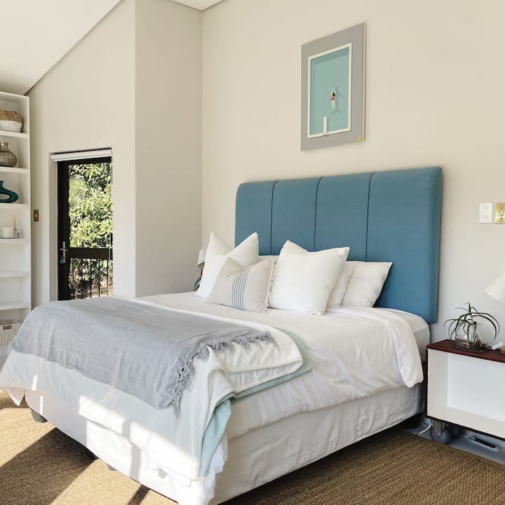 Main upstairs bedroom with sunny outlook