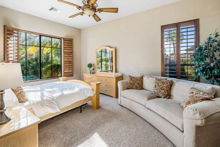 Bedroom #3 with 1 Queen bed, en-suite bathroom with tub & shower, walk-in closet.
