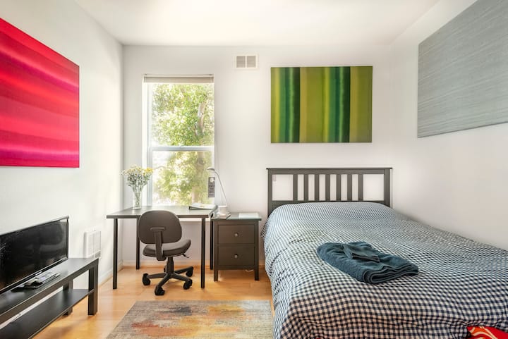 Private bedroom with ample closet space and study area that is adjacent to private bathroom for your use only.  Bedroom view with desk space including view of Pardee Mansion estate just outside your window.