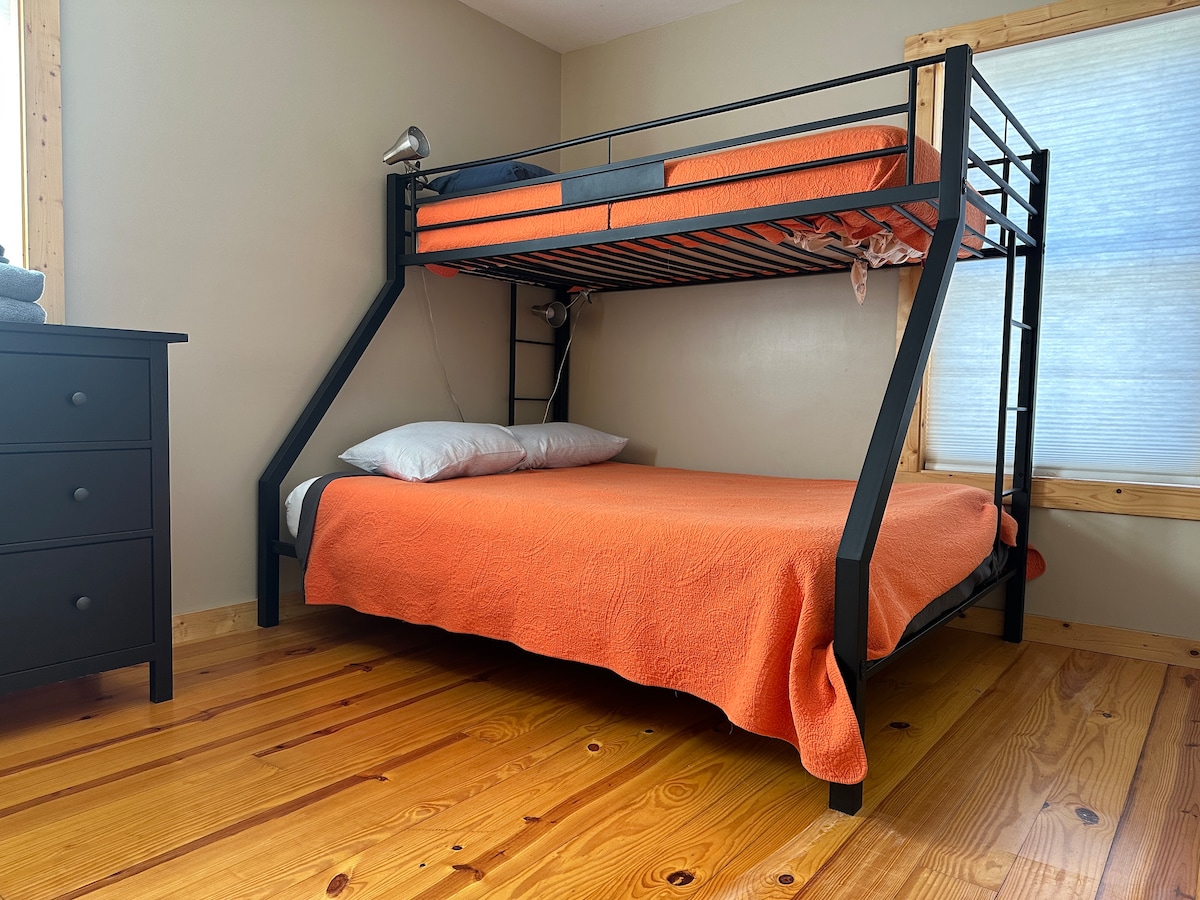 Queen bottom with half bunk in bedroom 2.