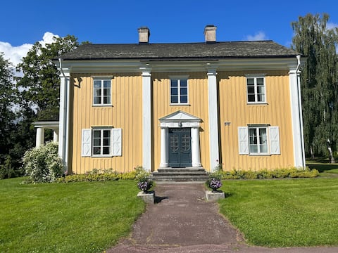 Spacious manor house wing in flower park