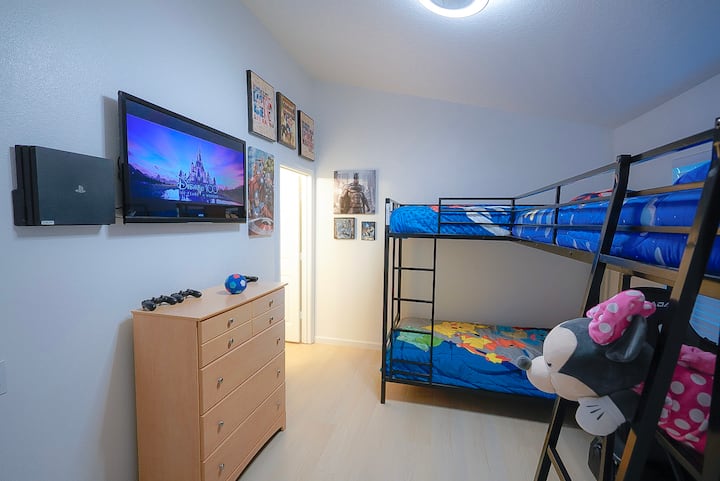 The fun zone! A triple bunk bed and a PlayStation 4 at the kids room 