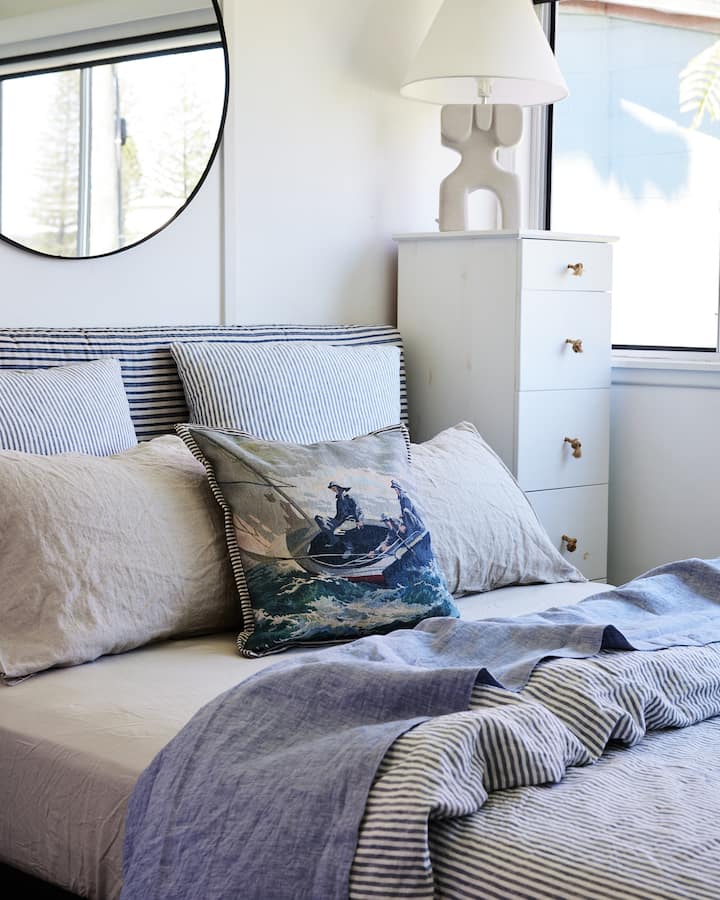 One of the Queen Bedrooms.  French linen sheets and ceiling fan. 
