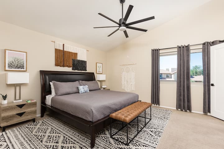 Spacious Master Suite: King memory foam mattress & 55” 4K HDTV.