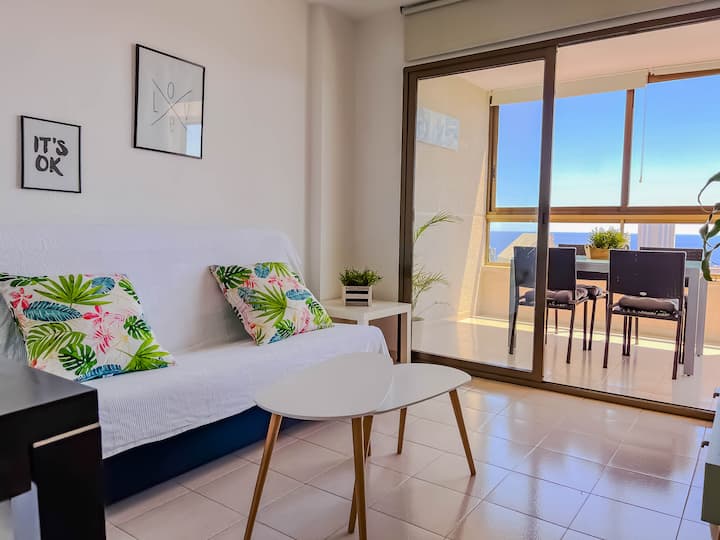 Salón con sofá cama de dos plazas