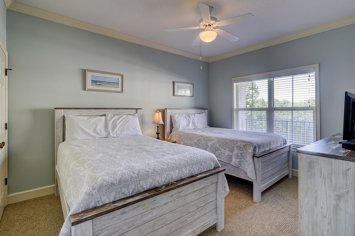 Second bedroom includes two full beds 