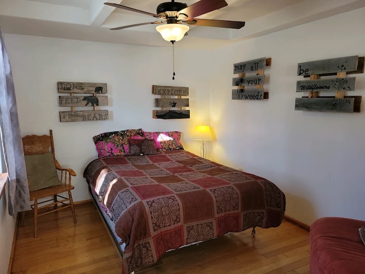Queen bed off the dining room