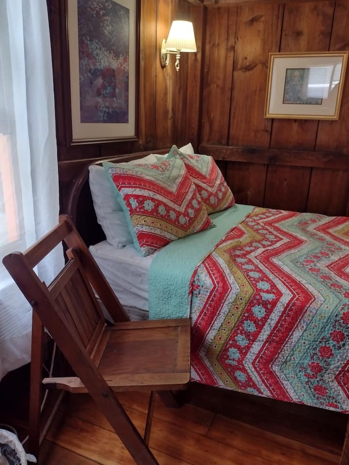 1st Bedroom- full bed, dresser, AC unit