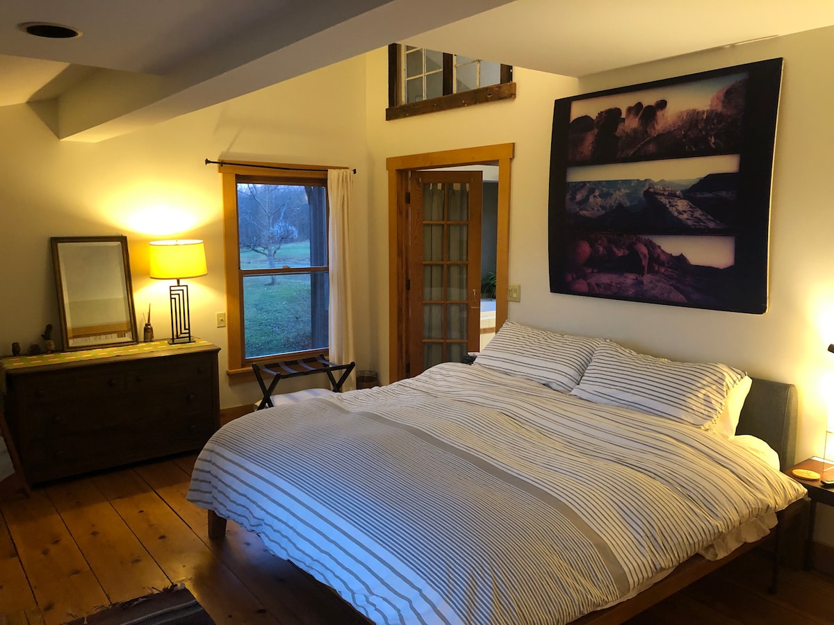 Primary bedroom with king bed