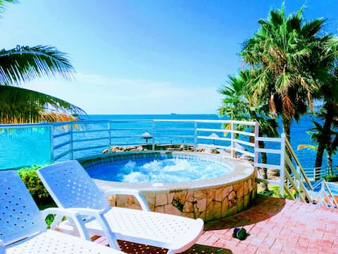 Cozy apartment with a private beach