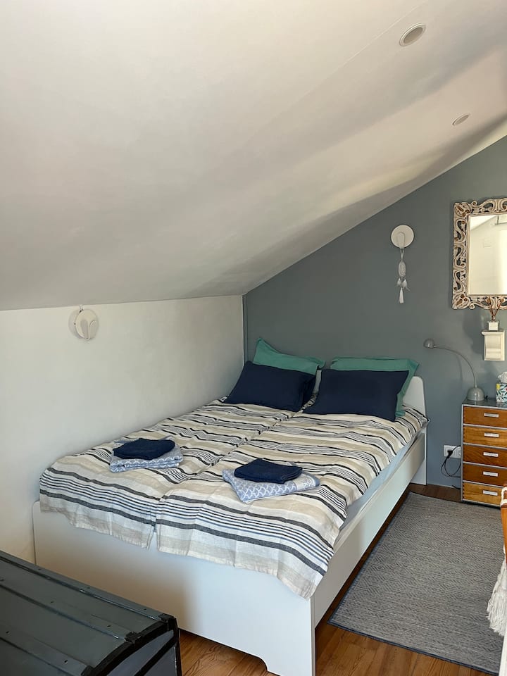 Second bedroom with 140cm wide double bed. You can also access the roof terrace from this room.