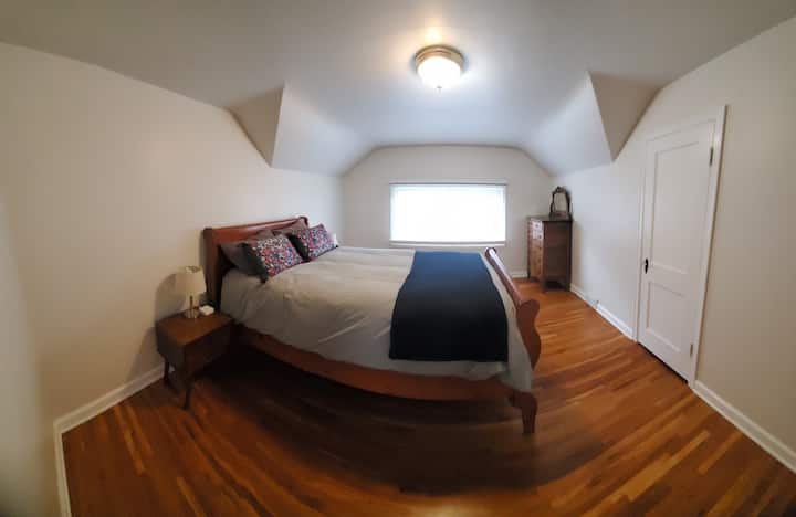 Master bedroom with large closet and lots of natural sunlight