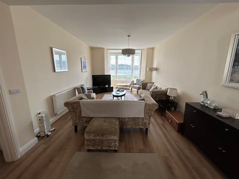 Top performing Airbnb: Luxury beach front apartment- magnificent views in Pensarn, Marl, Aberconwy, Castle, Deganwy