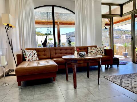 Successful Airbnb property: Fantastic view,pool & garden with high standard! in Mogán