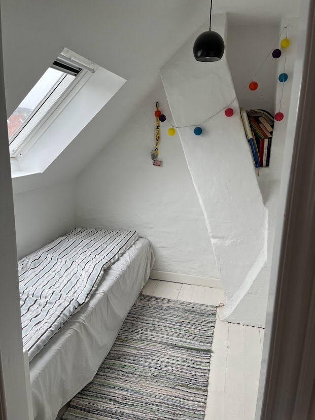 Small bedroom with single bed on 2nd level.