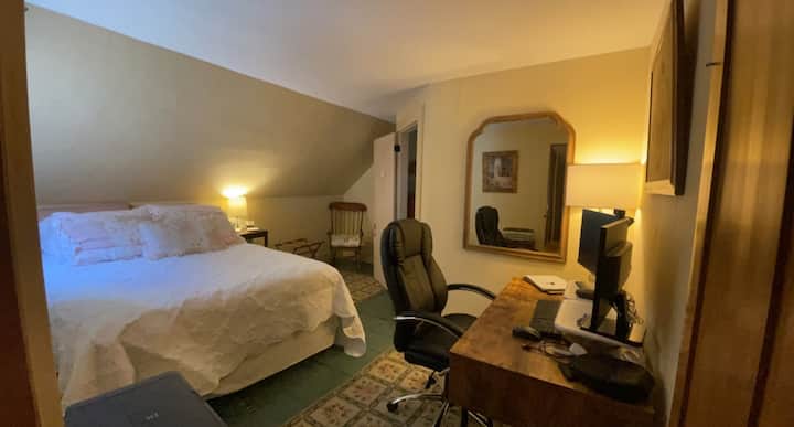 The Green Room is located on the 2nd floor and has a Queen bed. This room is located adjacent to the Loft (you walk through this room to get to the Loft) and to the hall.