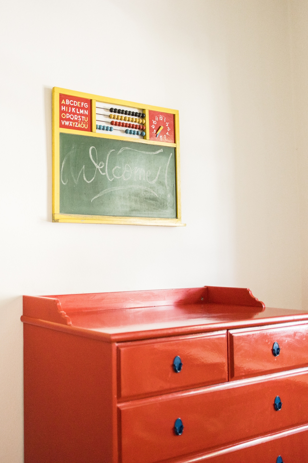 The children's room is located at the front of the house and like every bedroom has blackout blinds, double paned windows, and screens on both windows for bug-free breezes. 