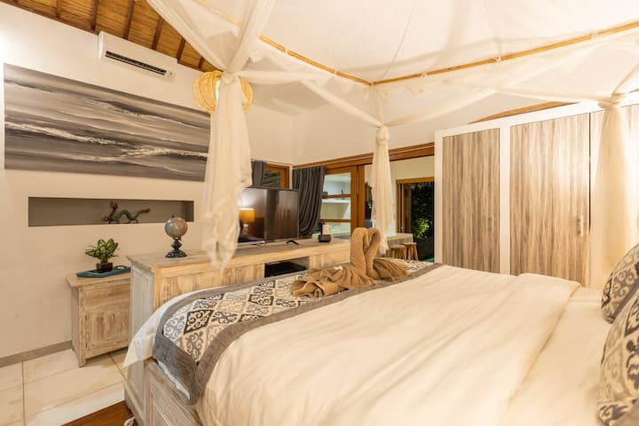 Blottissez-vous au lit pour une soirée cinéma avec Netflix et des DVD disponibles sur la télévision intelligente de 40 pouces