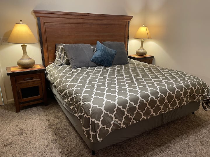 Master bedroom with king bed. Includes TV and en suite.