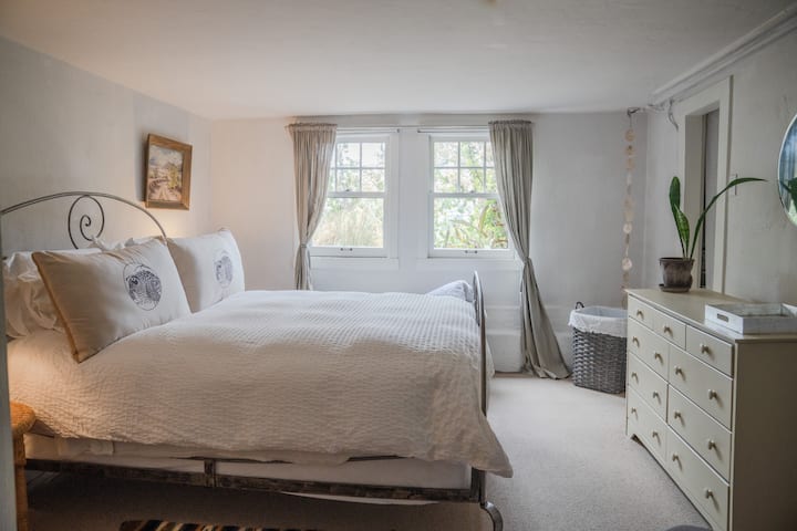 Two closets and full dresser for storage needs.