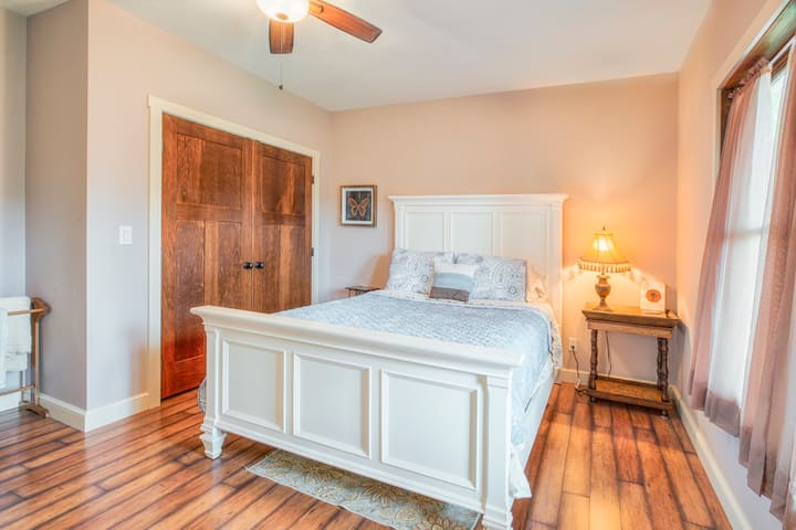 Bedroom 1 has a very comfortable queen mattress that our guests love. You'll have full use of the closet for your stay.