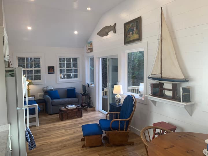 Living/dining/kitchen great room with slip lap walls.